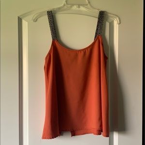 Orange flowy tank